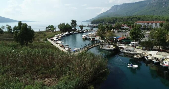 Aerial view of Akyaka town and High mountains next to the sea Mugla Turkey
