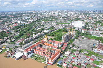 Obraz premium Helicopter fly over bangkok