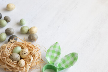 Fototapeta na wymiar Easter background with eggs, top view, soft colors, space for text, simplicity.