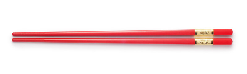 Top view of red chopsticks on white background