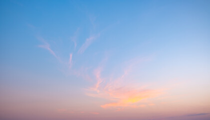 Colorful sunset and sunrise with clouds. Blue and orange color of nature. Many white clouds in the...