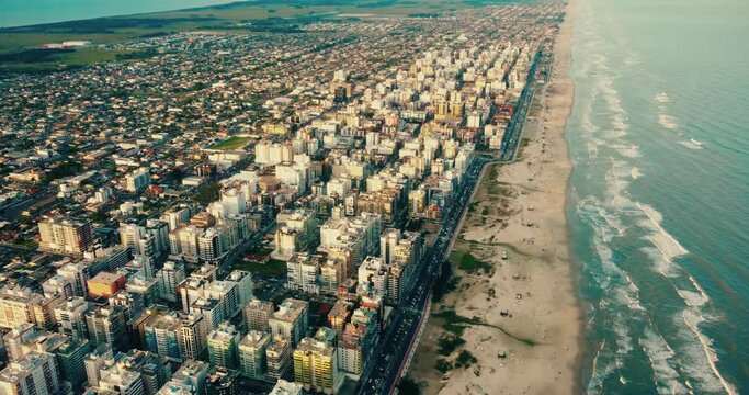 Cap&atilde;o da canoa beach at sunset summer bildings houses drone