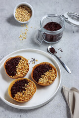 Martabak Terang Bulan mini, martabak manis mini or mini sweet martabak (mattabak), is Indonesian popular street food, made from flour, egg, yeast, topped with peanuts with chocolate