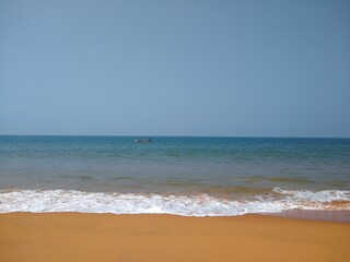 Fototapeta na wymiar fishing boat in the sea, seascape view Thiruvananthapuram Kerala