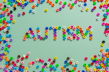 child hands holding jigsaw puzzle heart shape, Autism Day