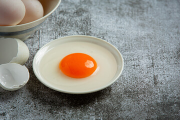 Duck eggs on dark background