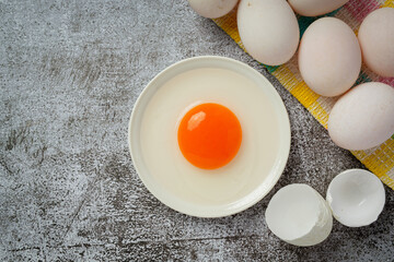 Duck eggs on dark background