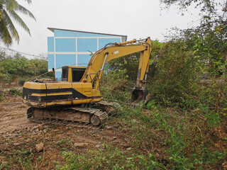 The excavator is adjusting the area