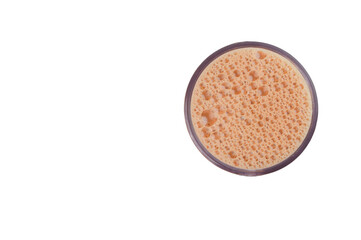 Tea with milk in a mug isolated on a white background.