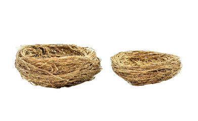 Bird nest isolated on white background. Side view of two size empty bird nest. A bird nest is the spot in which a bird lays, incubates its eggs and raises its young.