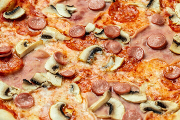 Italian pizza capriciosa mushroom tomato and mozzarella cheese. Food recipe background. Close up
