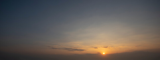 Beautiful sunset sky and clouds with dramatic light, Twilight sky and sun rays, Orange and red sky background with light of the sun-Image