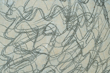 Curved pattern created by digging the surface of the cement face. for background and textured.