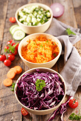 bowl of vegetable salad and ingredient