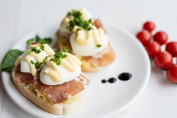 prosciutto dry hure ham with egg mayo dressing open bread sandwich with salad vegetables finger party food 