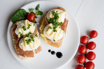 prosciutto dry hure ham with egg mayo dressing open bread sandwich with salad vegetables finger party food 
