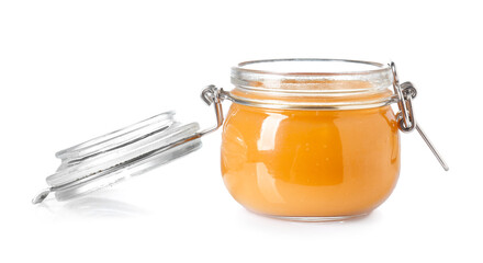 Jar of tasty pear jam on white background