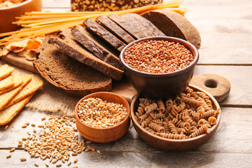 Set of different products on wooden background