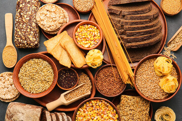 Set of different products on dark background, closeup