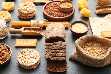 Set of different products on dark background