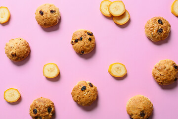 Composition with tasty banana cookies on color background