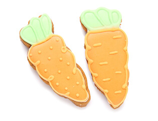 Tasty Easter cookies in shape of carrot on white background