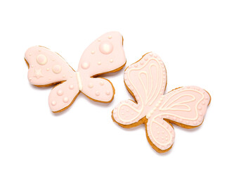 Tasty Easter cookie in shape of butterfly on white background
