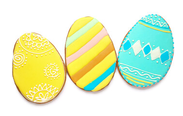 Tasty Easter cookies in shape of egg on white background