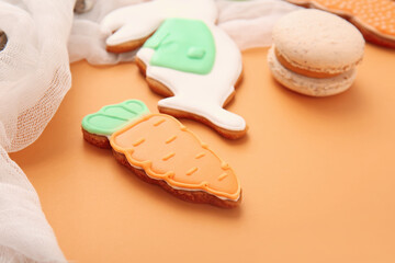 Tasty Easter cookies on color background