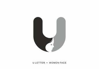 Black grey color of U initial letter with women face shape © Adipra