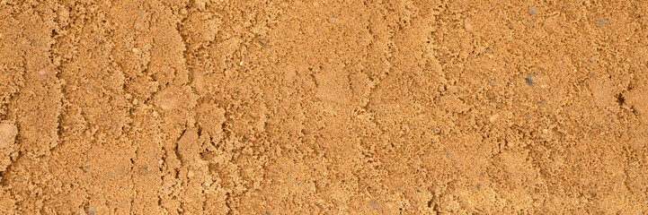 background texture from the smooth surface of the sand. top view. banner