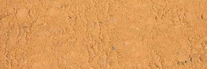 background texture from the smooth surface of the sand. top view. banner
