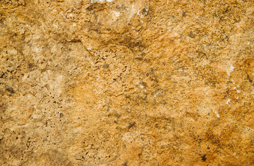 The texture of the stone is beige.Rock, decorative stone. Background and texture.