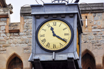 Ancient clock on Crown Jewels building of Tower of London, UK