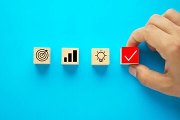 Business process management, Businessman plan a project with wooden cubes with icon business strategy on blue background. copy space