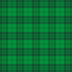 Fototapeta premium St. Patricks day tartan plaid. Scottish pattern in green and dark green cage. Scottish cage. Traditional Scottish checkered background. Seamless fabric texture. Vector illustration