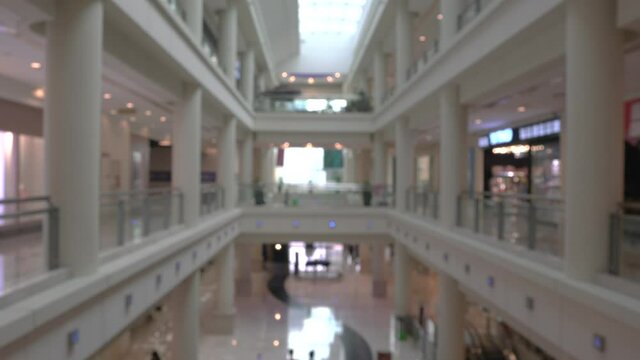 4K blur, abstract or defocus shopping mall or department store background.