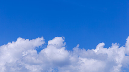 Blue sky background with clouds