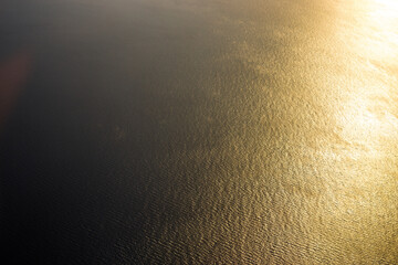 Nature blurred abstract background Of the colorful morning sun, a large lake, can see the scenery all around, cool atmosphere from the wind blowing all the time