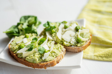 green food open sandwich green dip bread spread avocado, pea, spenach dip 