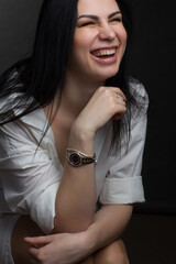 Studio portrait of a brunette in white T-shirt