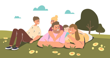 Big family together lying on green grass in summer park. Parents with three kids