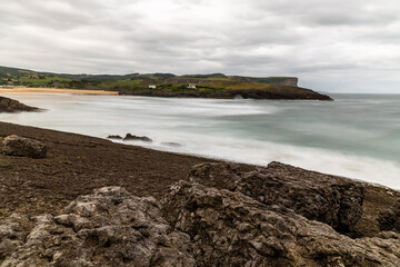 Long exposure view of rocky coast in Ajo, Cantabria, Spain.