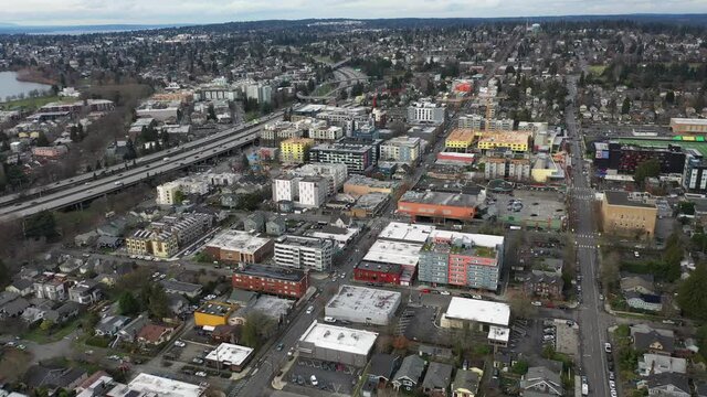 Cinematic aerial drone shot of Meridian, Roosevelt, Maple Leaf, University District, Green Lake suburbs