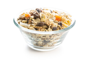 Beakfast cereals in bowl. Healthy muesli with oat flakes, nuts and raisins