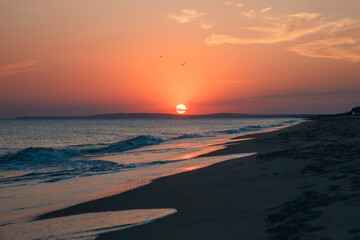 Fototapeta na wymiar sunset on the sea beach