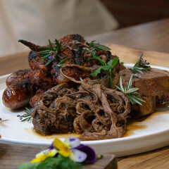 Pulled pork, sausage and steak