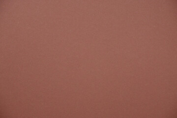 Colored Brown background. Paper, cardboard background. High resolution paper texture.