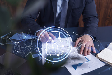 A businessman in formal wear signing the contract to prevent probability of risks in cyber...