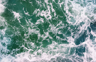Abstract blue sea water with white wave
